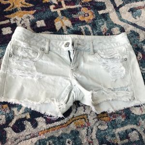 Size 6 light wash distressed jean shorts